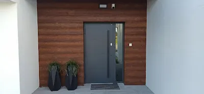 Dom-Clar. Spòłka Cywilna Dostawca okien, drzwi, bram, żaluzji, markiz.